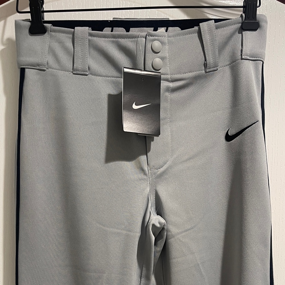 Brand New Nike DriFit Grey/Gray w/ black stripe Baseball pants.